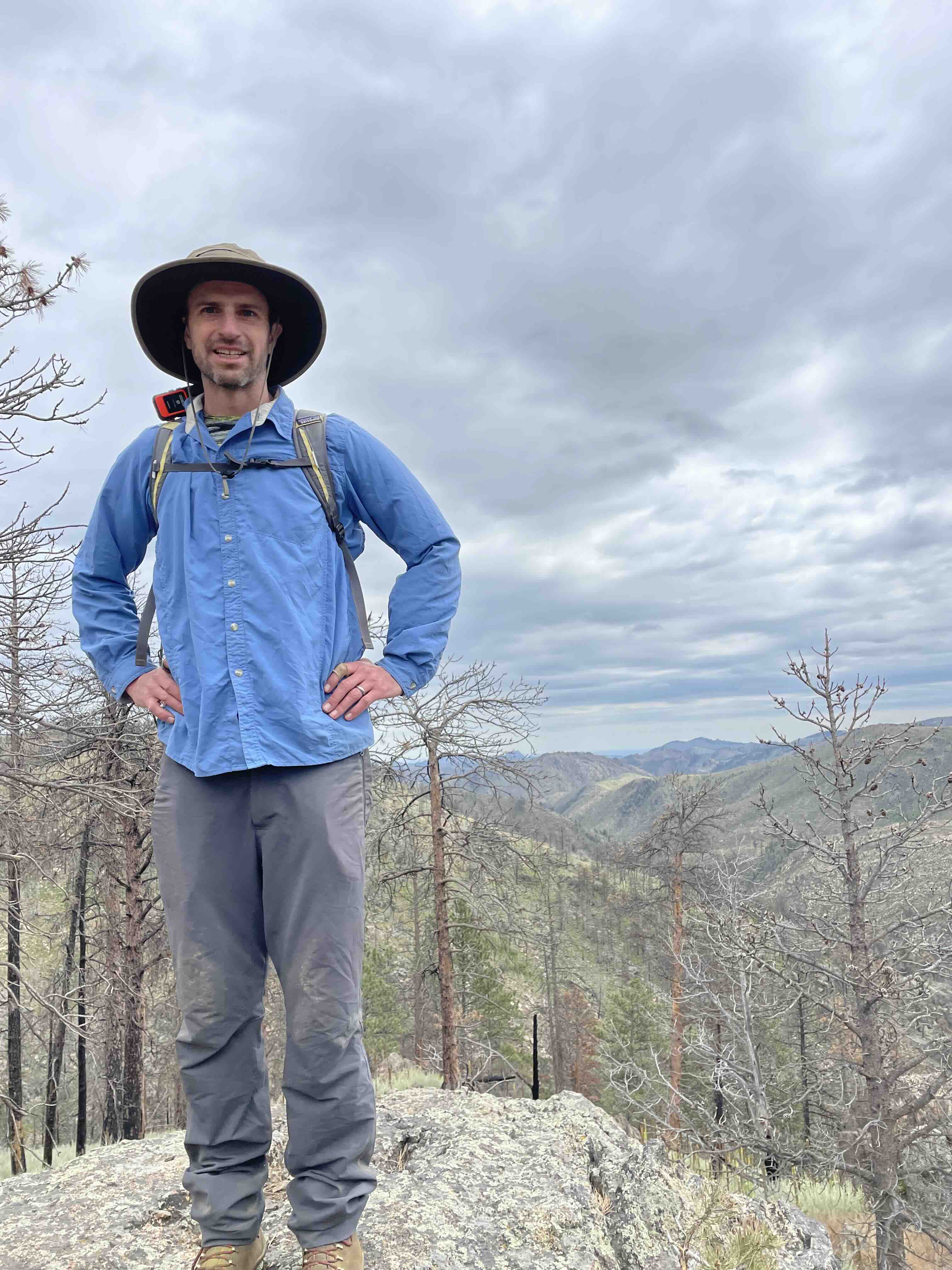 Jeff hiking on a mountain trail
